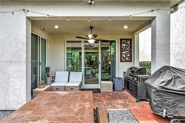 view of patio featuring ceiling fan