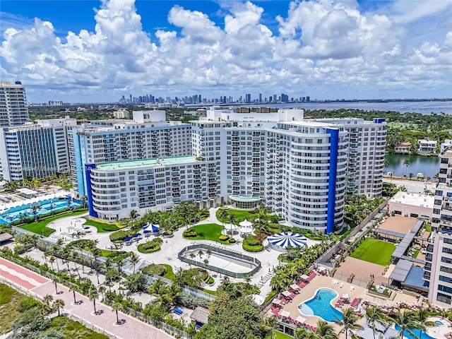 birds eye view of property featuring a water view