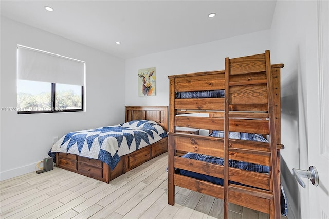 bedroom with light hardwood / wood-style flooring