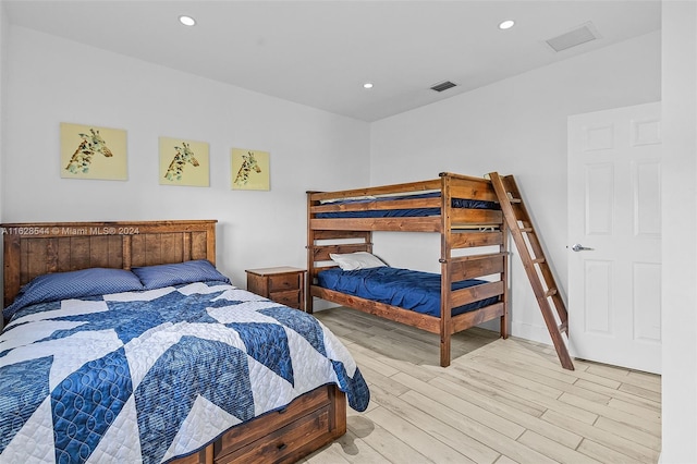 bedroom with light hardwood / wood-style flooring