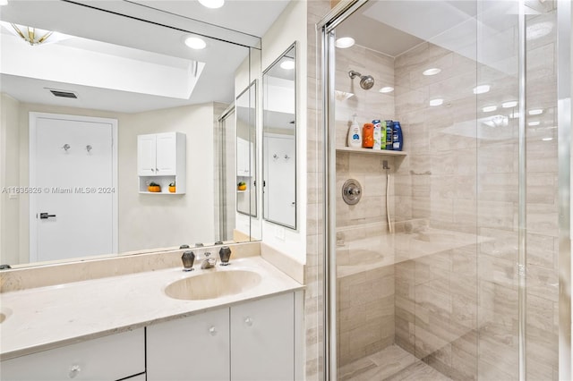 bathroom featuring vanity and walk in shower