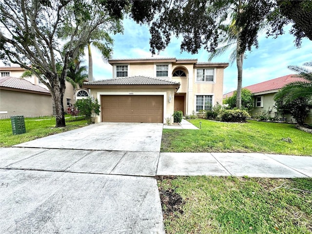 view of front of house featuring a tile roof, stucco siding, an attached garage, driveway, and a front lawn