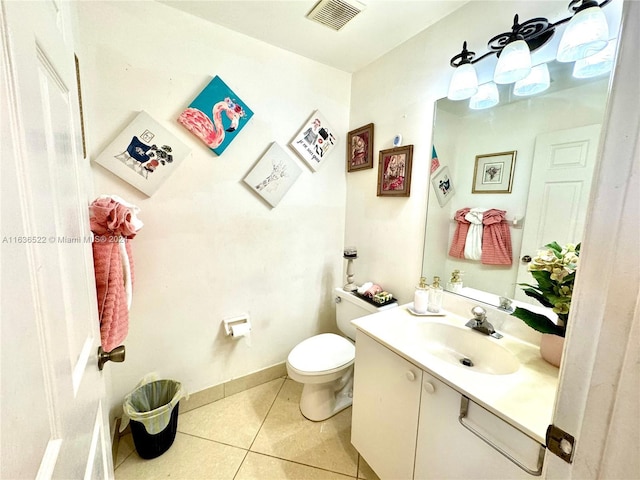 bathroom with visible vents, baseboards, toilet, tile patterned flooring, and vanity