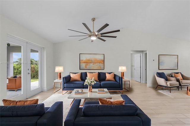 living room featuring ceiling fan, light wood-type flooring, lofted ceiling, and french doors