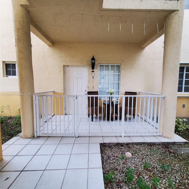 entrance to property with a porch