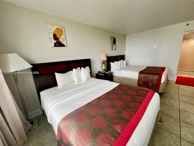 bedroom with tile patterned flooring