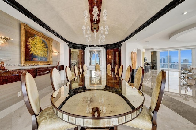 dining room featuring tile patterned flooring and a notable chandelier