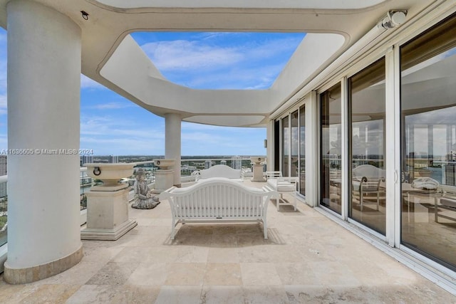 view of patio with a balcony