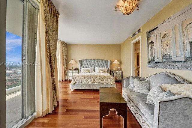 bedroom featuring wood-type flooring