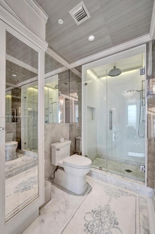 bathroom featuring a shower with door, tile walls, tile patterned flooring, crown molding, and toilet