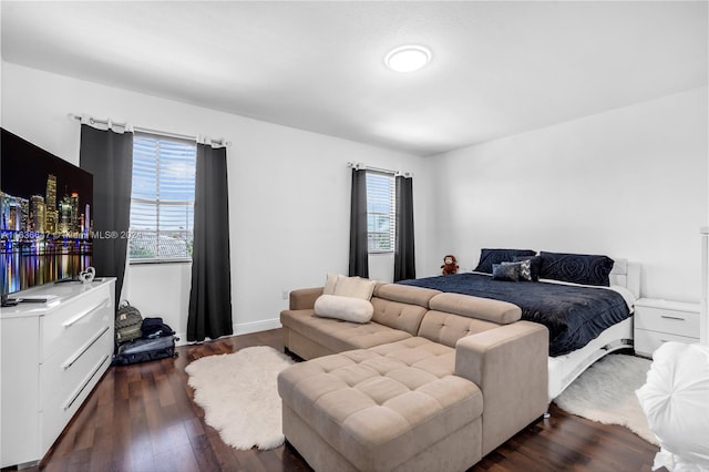 bedroom featuring dark wood-type flooring