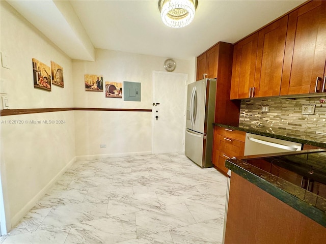 kitchen with tasteful backsplash, light tile patterned floors, dark stone counters, electric panel, and stainless steel appliances