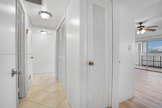 hall featuring light wood-type flooring