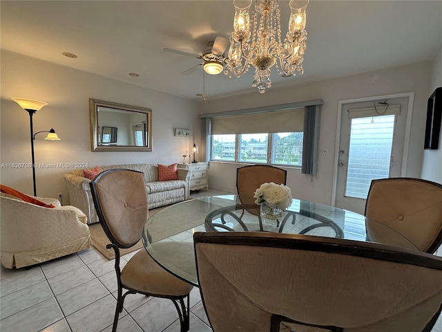 801 Atlantic Shores Blvd Unit 207, Hallandale Beach, FL 33009 - dining room featuring light tile patterned floors, a chandelier, and ceiling fan