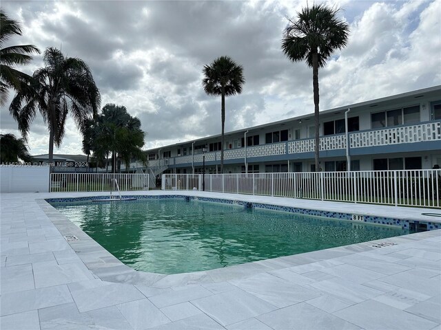 801 Atlantic Shores Blvd Unit 207, Hallandale Beach, FL 33009 - community pool featuring fence