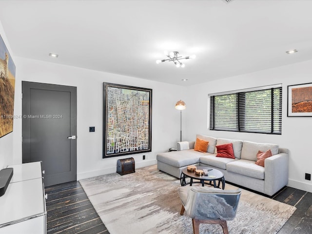 living room with dark hardwood / wood-style floors