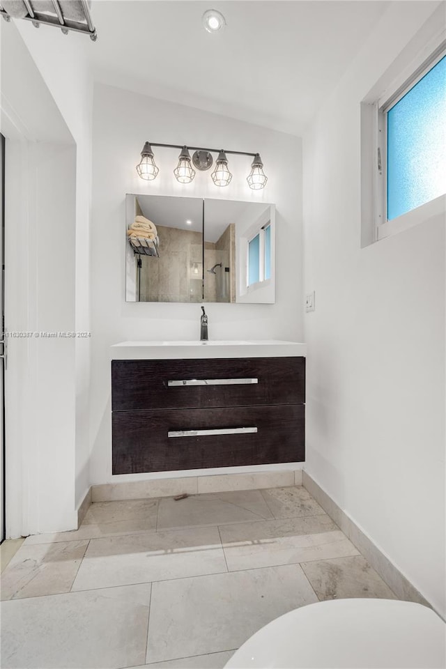 bathroom with vanity and tile patterned floors