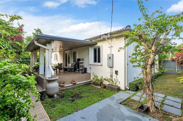 view of front of home with a wooden deck