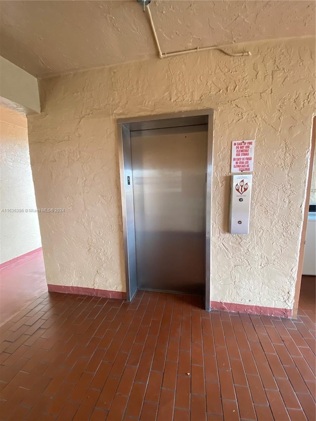 property entrance featuring elevator