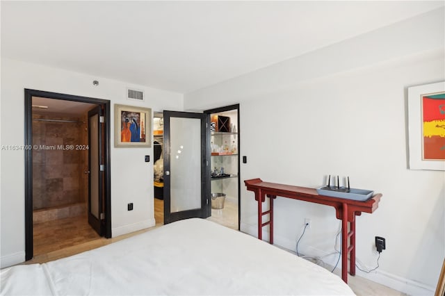 bedroom with ensuite bathroom