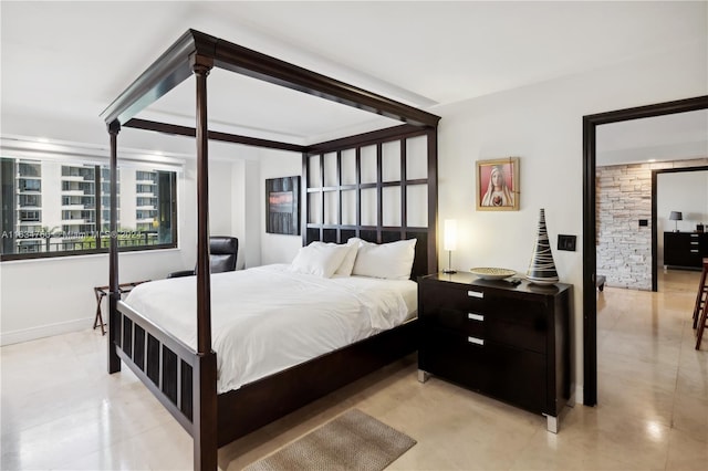 bedroom with light tile patterned floors