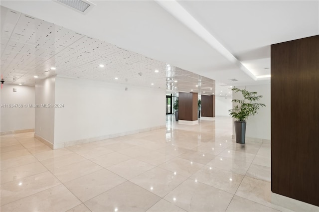 interior space featuring light tile patterned flooring