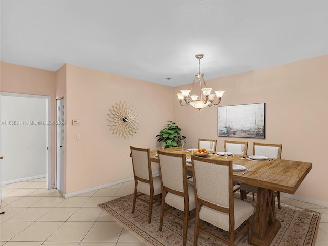 279 NW 119th Ave, Miami, FL 33182 - dining space featuring light tile patterned floors, a notable chandelier, and baseboards