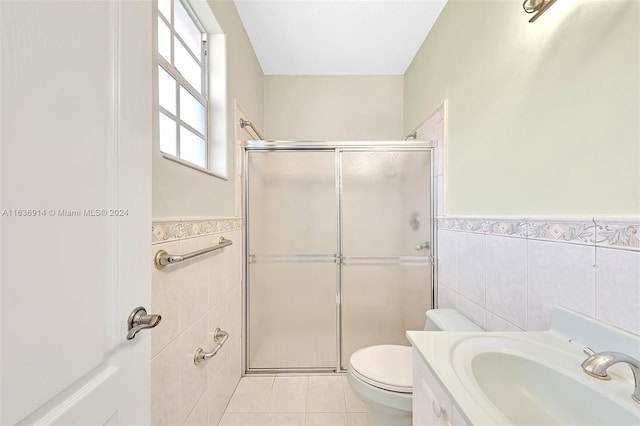 279 NW 119th Ave, Miami, FL 33182 - full bath with tile walls, toilet, tile patterned floors, a stall shower, and wainscoting