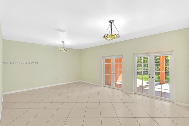 279 NW 119th Ave, Miami, FL 33182 - spare room with french doors, light tile patterned floors, baseboards, and visible vents