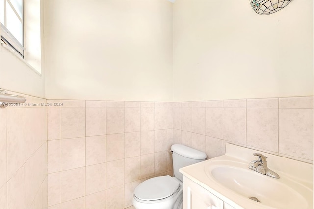 279 NW 119th Ave, Miami, FL 33182 - bathroom featuring tile walls, toilet, and vanity