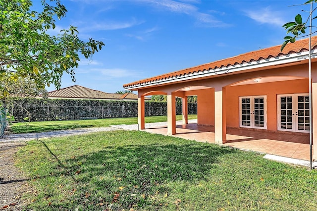 279 NW 119th Ave, Miami, FL 33182 - view of yard with fence, french doors, and a patio area