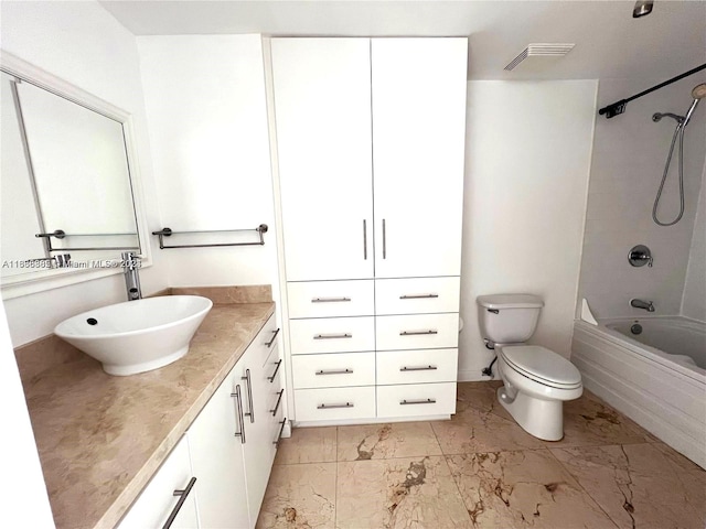 full bathroom featuring toilet, shower / bathing tub combination, and vanity