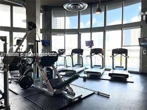 gym with a wealth of natural light