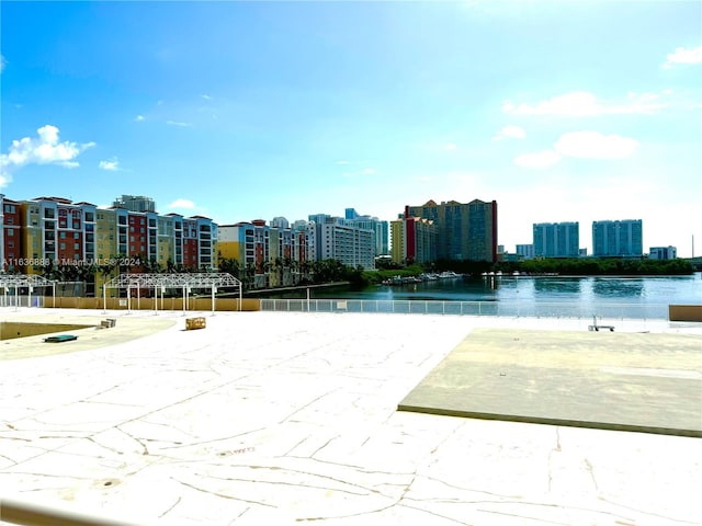 view of home's community with a water view