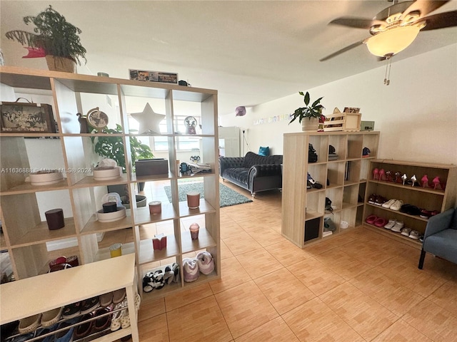 wine cellar featuring ceiling fan