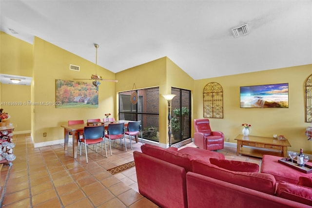 tiled living room with lofted ceiling