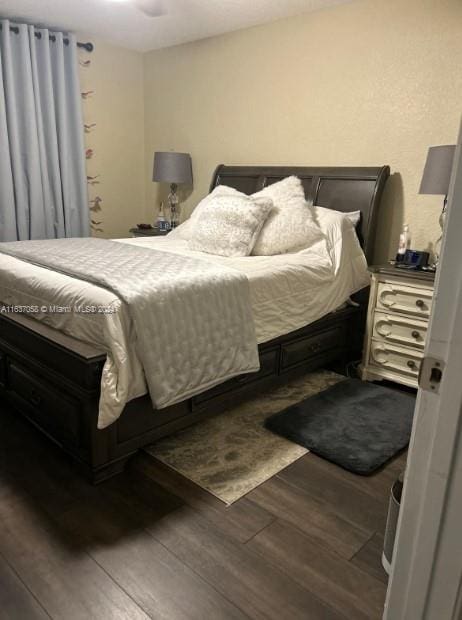 bedroom featuring hardwood / wood-style floors