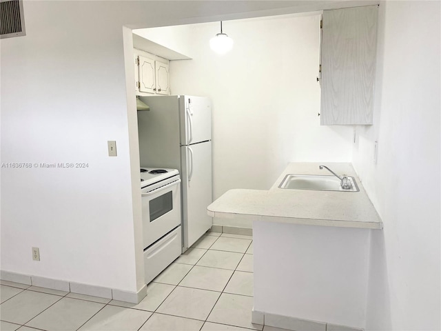 kitchen with light tile patterned floors, kitchen peninsula, white electric range, extractor fan, and sink