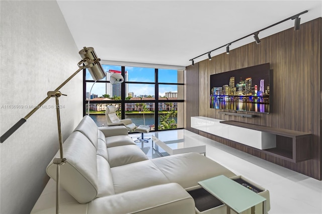 living room featuring expansive windows and track lighting