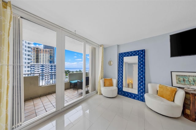 sitting room featuring tile patterned flooring