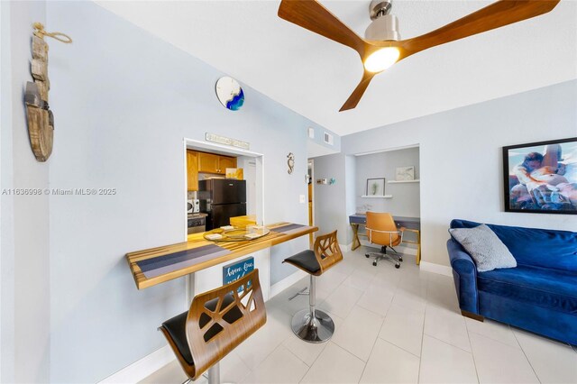 living room featuring light tile patterned floors