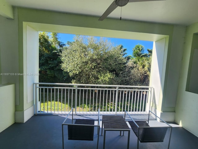 balcony featuring ceiling fan