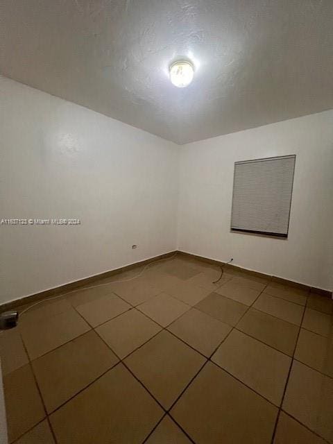 view of tiled empty room