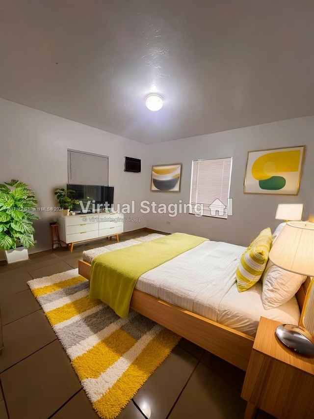 bedroom featuring tile patterned flooring