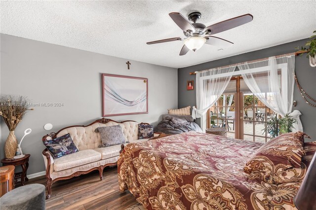 bedroom with ceiling fan, access to outside, a textured ceiling, and hardwood / wood-style floors