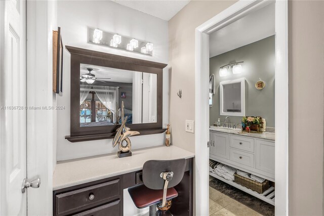 bathroom featuring ceiling fan, tile patterned floors, and vanity