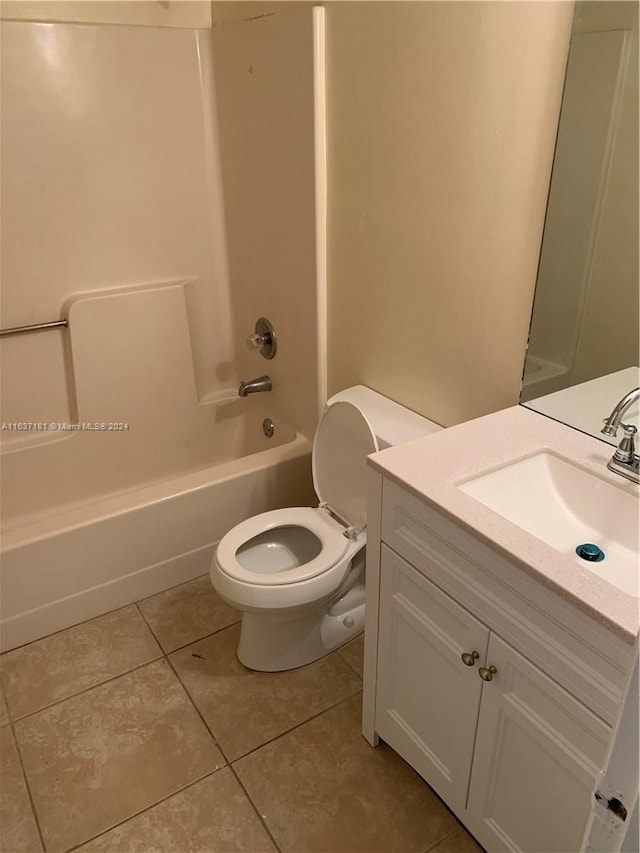 full bathroom with vanity, toilet, tile patterned floors, and bathing tub / shower combination