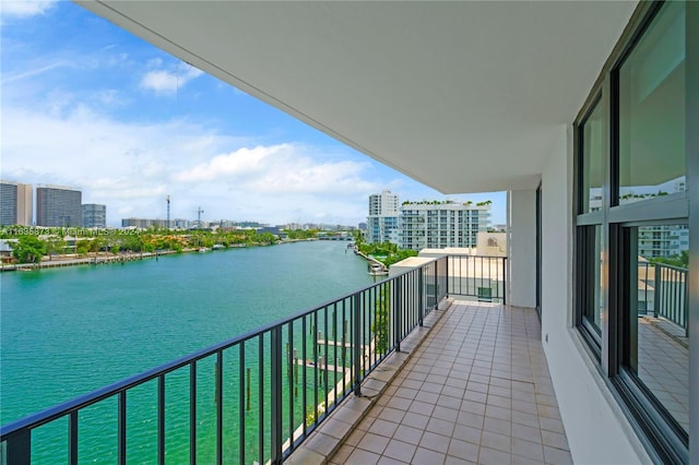 balcony featuring a water view