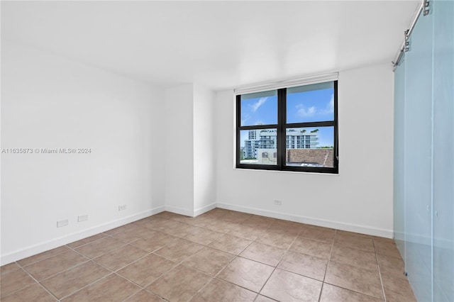 view of tiled empty room