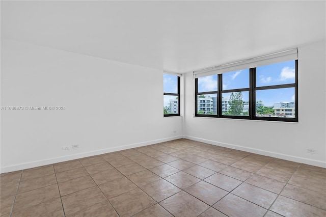 view of tiled spare room